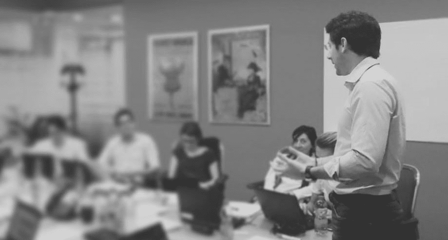 Man presenting to a group of people